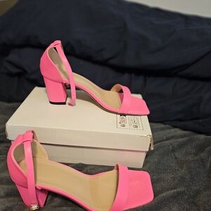Pink heels...never worn